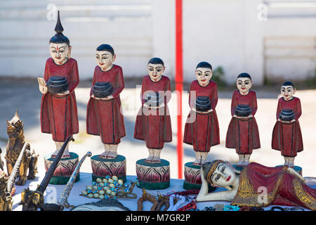 Products for sale, monk statue ornaments at Shwe Yan Pyay monastery, Shwe Yaunghwe Monastery, Nyaungshwe, Inle Lake, Myanmar (Burma), Asia in February Stock Photo