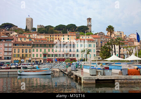 Old harbour (Vieux Port) and old town 'Le Suquet', Notre-Dame d'Esperance church at Mont Chevalier, Cannes, french riviera, France, Europe Stock Photo