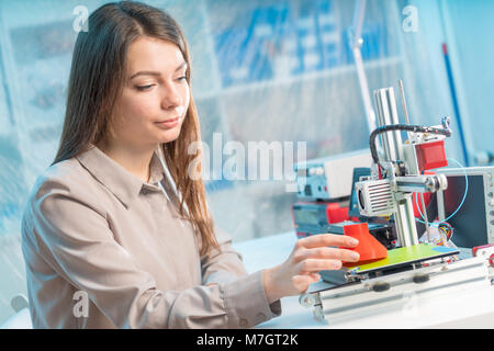 Professional female engineer working with 3d printing Stock Photo