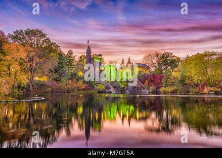 New York, New York at Central Park's castle and pond during an autumn dusk. Stock Photo