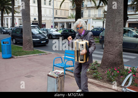 Street musician at Boulevard La Croisette, Cannes, french riviera, South France, France, Europe