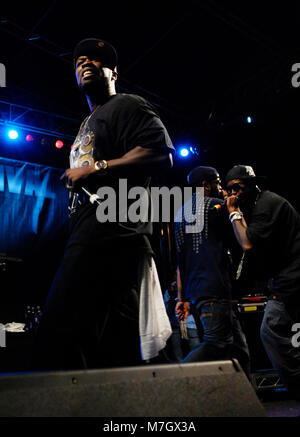 Rappers 50 Cent, Lloyd Banks and Tony Yayo of G-Unit performs at the This is 50 Festival at Governor's Island on October 3, 2009 in New York. Stock Photo