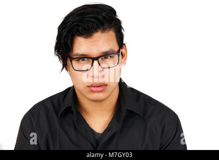 Serious young hispanic man with glasses over white background Stock Photo