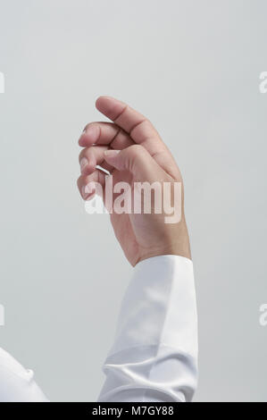 Empty Male Hand For Placing Mobile Phone or Other Object Isolated Close Up Stock Photo