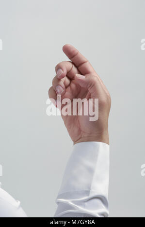 Empty Male Hand For Placing Mobile Phone or Other Object Isolated Close Up Stock Photo