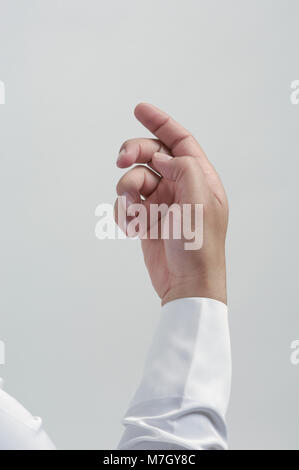 Empty Male Hand For Placing Mobile Phone or Other Object Isolated Close Up Stock Photo