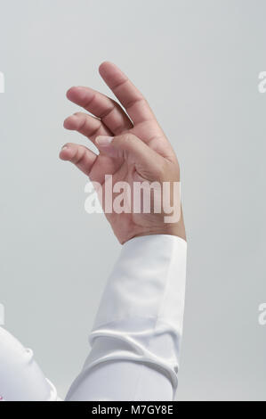 Empty Male Hand For Placing Mobile Phone or Other Object Isolated Close Up Stock Photo