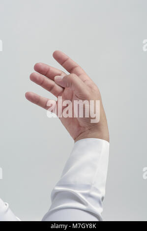 Empty Male Hand For Placing Mobile Phone or Other Object Isolated Close Up Stock Photo