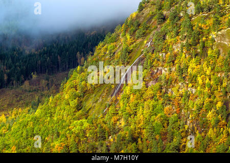 Seasonal waterfall in wild scenery of low mountain in Evje, central Norway. Stock Photo