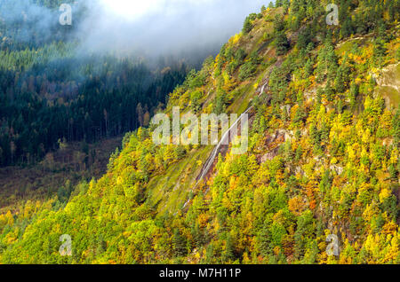 Seasonal waterfall in wild scenery of low mountain in Evje, central Norway. Stock Photo