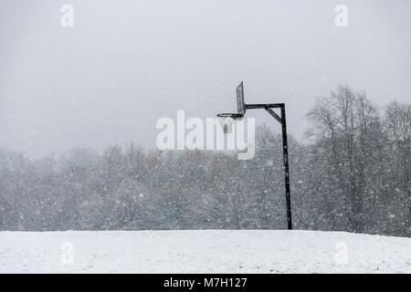 Basketball court in the snow Stock Photo