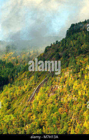 Seasonal waterfall in wild scenery of low mountain in Evje, central Norway. Stock Photo