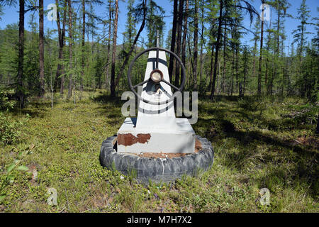 Truck driver's souvenir monument on the Kolyma highway. Stock Photo