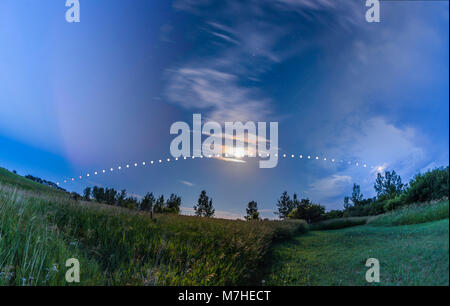 Arc of the Summer Moon in Alberta, Canada. Stock Photo