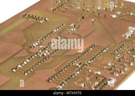 Closeup of a self-made printed circuit board with microcontroller Stock Photo