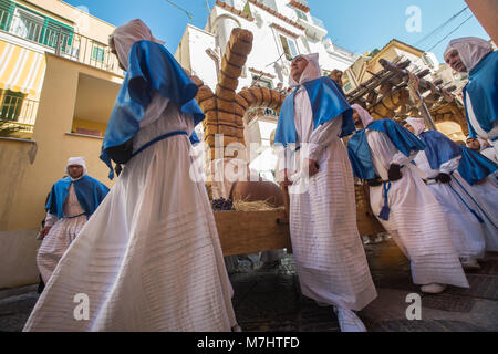 PROCIDA, ITALY - MARCH 25, 2016 - Every year the procession of the 'Misteri' is celebrated at Easter's Good Friday in Procida, Italy. Islanders carry through the streets elaborate and heavy 'Misteries' representing scenes from The Bible Stock Photo