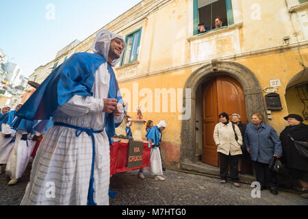PROCIDA, ITALY - MARCH 25, 2016 - Every year the procession of the 'Misteri' is celebrated at Easter's Good Friday in Procida, Italy. Islanders carry through the streets elaborate and heavy 'Misteries' representing scenes from The Bible Stock Photo