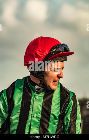 Hereford, Herefordshire, UK. 10th March, 2018. Jockey Andrew Tinkler is seen after winning the 4:00pm race on Just Your Type at Hereford racecourse during Ladies Day in Hereford on 10th March 2018. Credit: Jim Wood/Alamy Live News Stock Photo