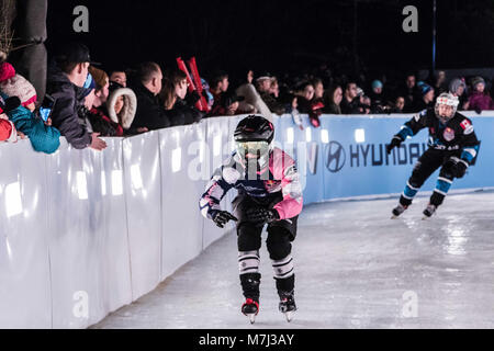 Edmonton, Alberta, Canada. 10th Mar, 2018. Anais Morand and Maxie Plante head into the last of the moguls at the Red Bull Crashed Ice in Edmonton for the final event of the season. Credit: Ron Palmer/SOPA Images/ZUMA Wire/Alamy Live News Stock Photo