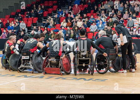 Leicester, UK, 11th March, 2018. Wheelchair Rugby Quad Nations: GBR vs JPN at Leicester Arena   Day three GBR loses with a score of 41 vs 45 to Japan.   Japanese celebrate the win after the game with coach Kevin Orr. (c) pmgimaging /Alamy Live News Stock Photo