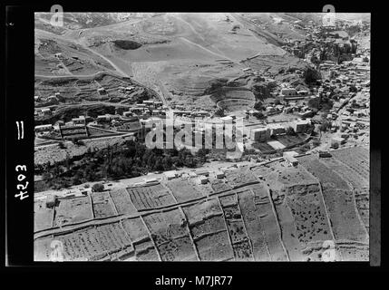 Air route to Baghdad via Amman and the desert. Amman showing Roman theatre and Philadelphia Hotel LOC matpc.15936 Stock Photo