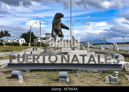 A Milodon statue welcomes visitors to the town of Puerto Natales, Chile Stock Photo