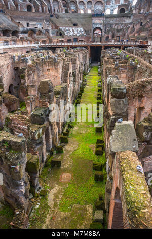 Interior closeup detail of he Colosseum or Coliseum, also known as the Flavian Amphitheatre, with the below ground level hypogeum, Rome. Lazio. Italy. Stock Photo