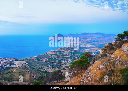 Panoramic view towards Monte Cofano seen in Erice, Sicily island, Italy. At sunset. San Vito lo Capo on the background Stock Photo