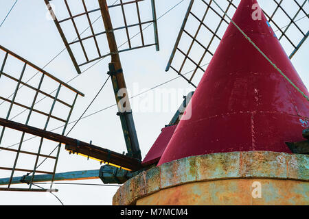 Wings of windmill in the salt evoporation pond in Marsala, Sicily island, Italy Stock Photo