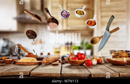 Flying cooking ingredients with food preparation. Copyspace for text. Concept of food , kitchen on background. Stock Photo