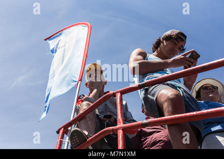 people cheering for athletes during Ironman 70.3 Pucon 2018 Stock Photo