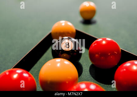 Broken up balls on a pool table Stock Photo