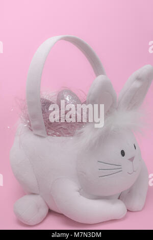 Easter basket filled with glittery eggs Stock Photo