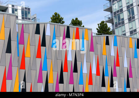 Colorful triangles design on the exterior wall of a modern building in Richmond, BC, Canada Stock Photo