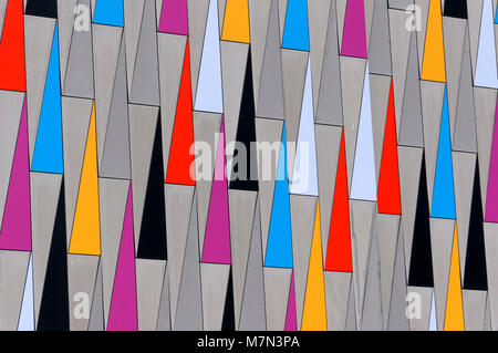 Colorful repeating triangles design on the exterior wall of a modern building in Richmond, BC, Canada Stock Photo