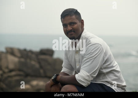 young asian man from Sri lanka posing. Stock Photo
