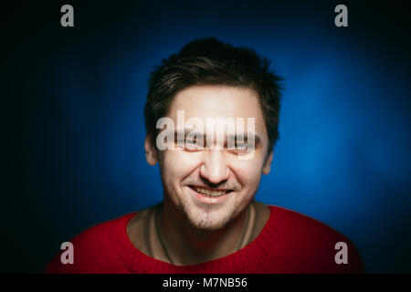 emotional young man photo in studio Stock Photo