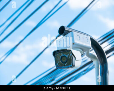 closed-circuit camera on white clouds background, Stock Photo