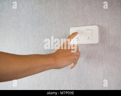 Switching on off the lights Stock Photo