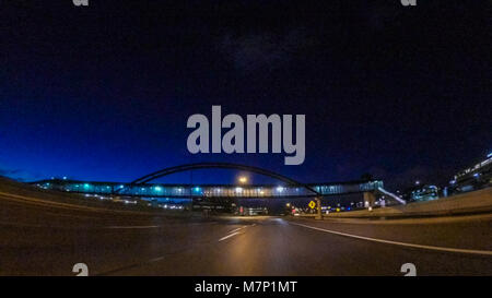 Driving on Interstate highway I25 at night. Stock Photo