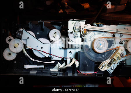 Close Image Of Drive Gears And Cogs In A Computer Printer For Extreme close-image-of-drive-gears-and-cogs-in-a-computer-printer-for-extreme