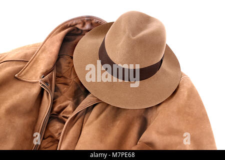 Classic combination of tan felt Fedora and calfskin leather jacket isolated on white (path provided). Stock Photo