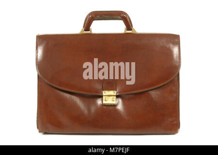Old worn brown leather briefcase set against a white background Stock Photo