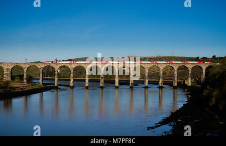 Virgin HS125 train crosses the Royal Border Bridge over the River Tweed  on the East Coast Mainline rail link between Edinburgh and London Kings Cross Stock Photo