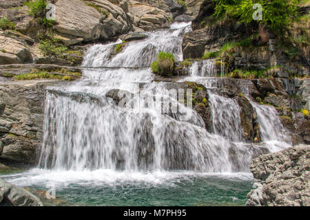 Lillaz waterfalls near Cogne, Gran Paradiso national park, Aosta Valley in the Alps, Italy Stock Photo