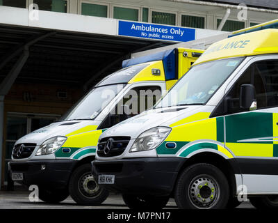 Two ambulances waiting outside an A&E department of a hospital Stock Photo