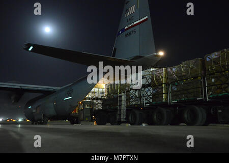 BAGRAM AIRFIELD, Afghanistan – A C-130 J Super Hercules is loaded with food supplies at Bagram Airfield, Afghanistan, June 14, 2014. Airmen assigned to the 455th Expeditionary Aerial Port Squadron prepared more than 18,000 pounds of food for delivery to Forward Operating Bases June 14, 2014. The perishables had to be delivered within three hours of being removed from the freezer. (U.S. Air Force photo by Master Sgt. Cohen A. Young/Released) 455th Air Expeditionary Wing Bagram Airfield, Afghanistan