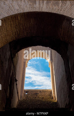 Archway inside Colosseum, Rome, Italy Stock Photo