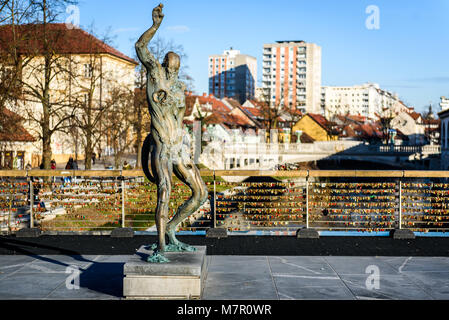 Statue of Prometheus on Butchers' bridge over river Ljubljanica, Ljubljana. A sculpture of Prometheus by famous Slovenian sculptor Jakov Brdar on brid Stock Photo