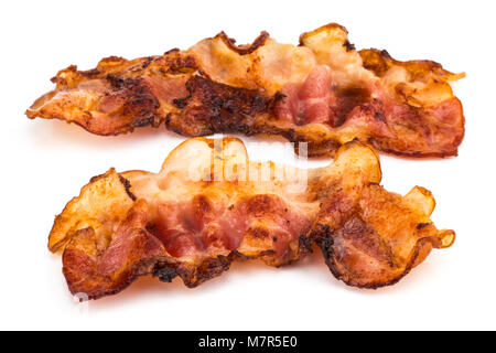two slices of fresh fried bacon isolated on a white background. Stock Photo
